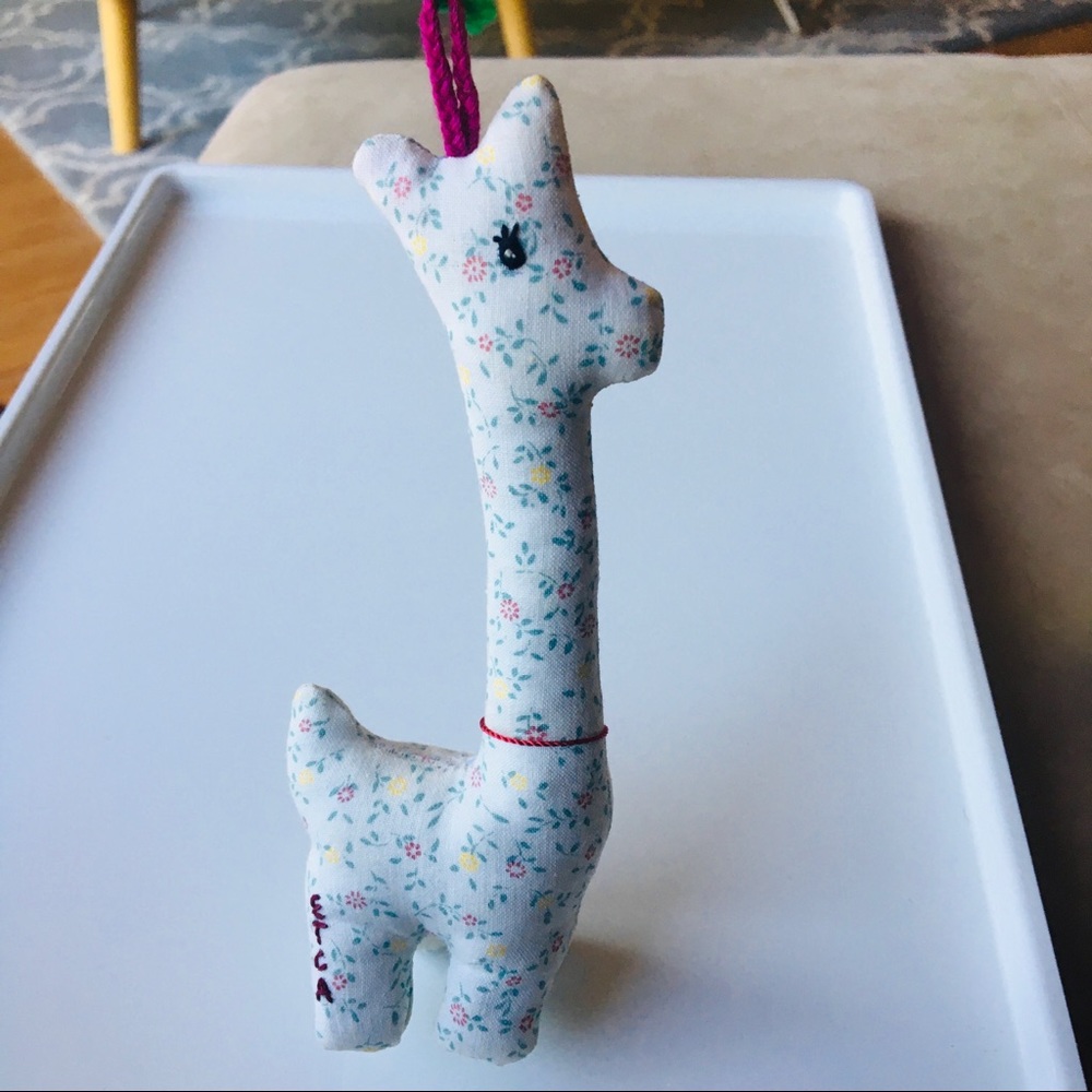 One handmade giraffe 🦒 keychain ornament